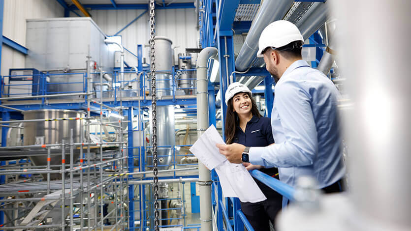 Coperion employees in industrial environment